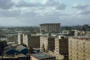 A commercial warehouse in Nairobi's industrial area with a Goodlife Movers truck outside.
