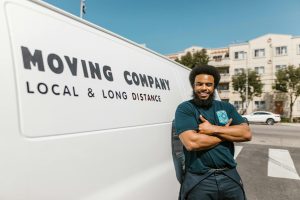 A reliable house moving service in Kenya loading furniture onto a truck.